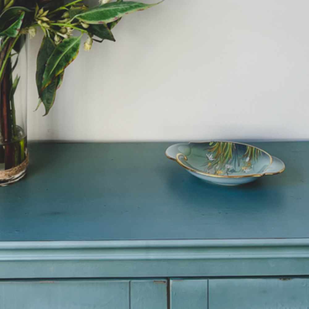 Subtle blue tones of bowl and cupboard in Astera lounge